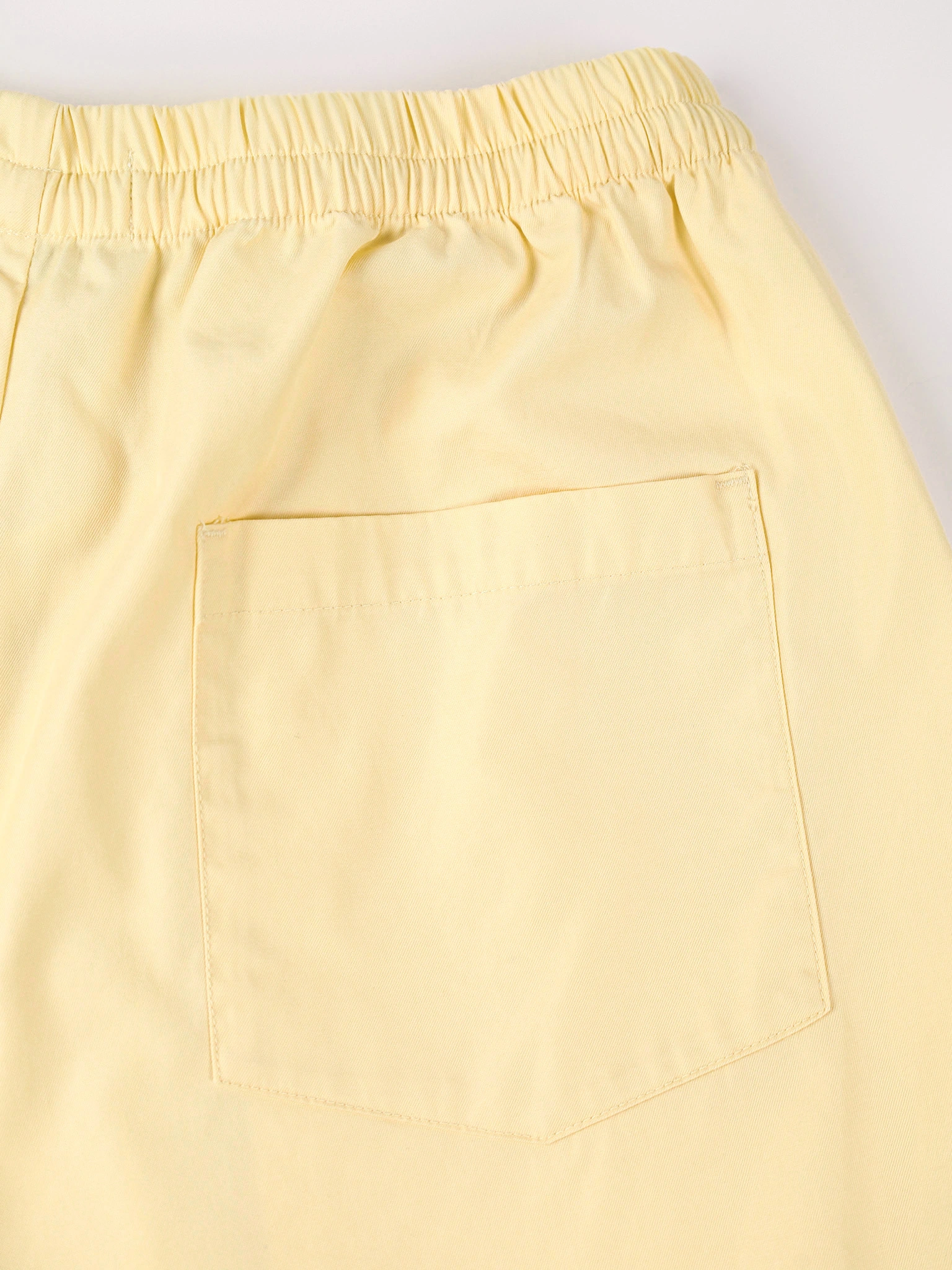 Брюки желтого цвета из смесового хлопка